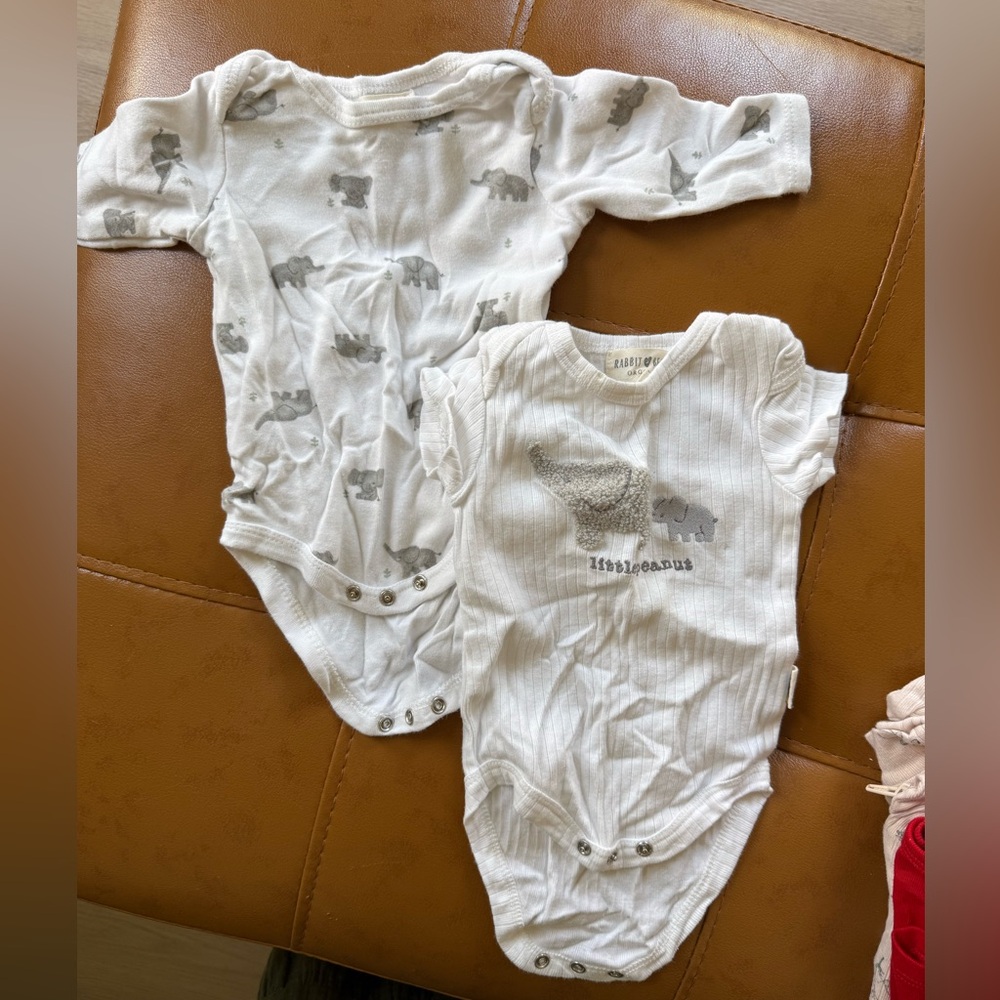 White Ribbed Bodysuit with Snap Closures